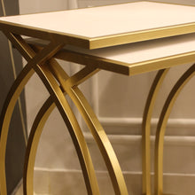 Juxtaposes Curved Design Nesting Table