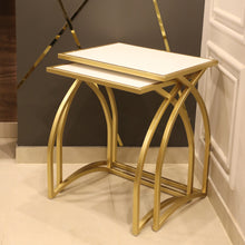 Juxtaposes Curved Design Nesting Table